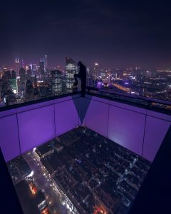 Man Standing on a Skyscraper