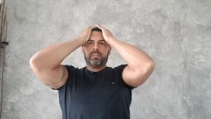 Frustrated Man Holding Head