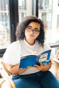 Woman Writing in Notebook